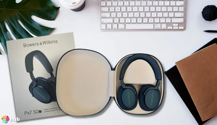 Bowers & Wilkins Px7 S2e Audiophile Headphones on a white office desk with professional arrangement for a review