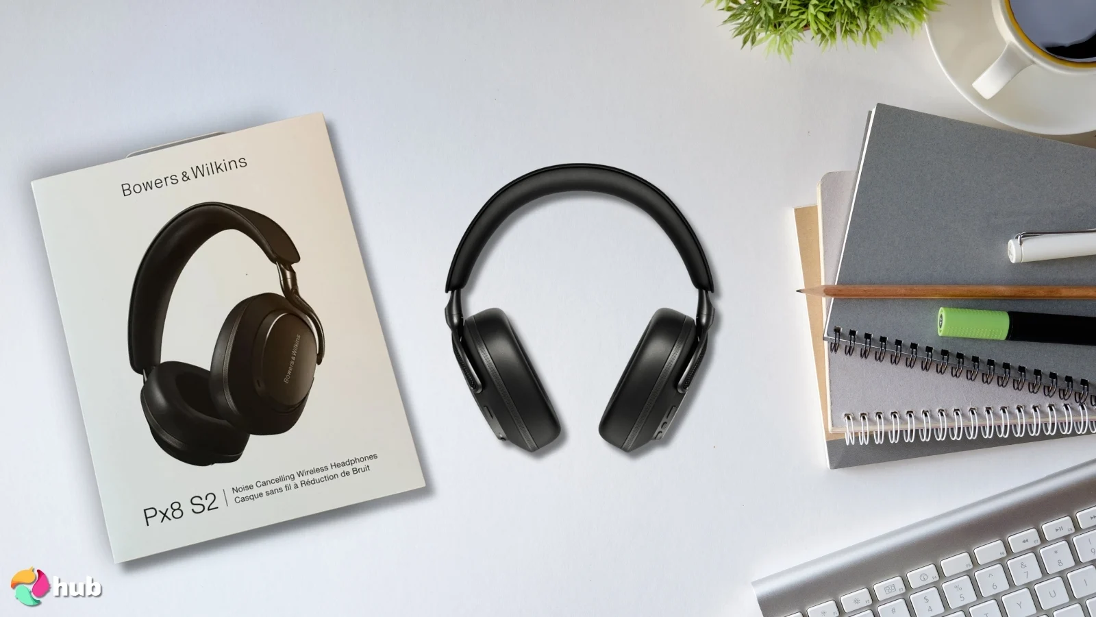 Bowers & Wilkins Px8 S2 Headphones on a white office desk arranged for a review