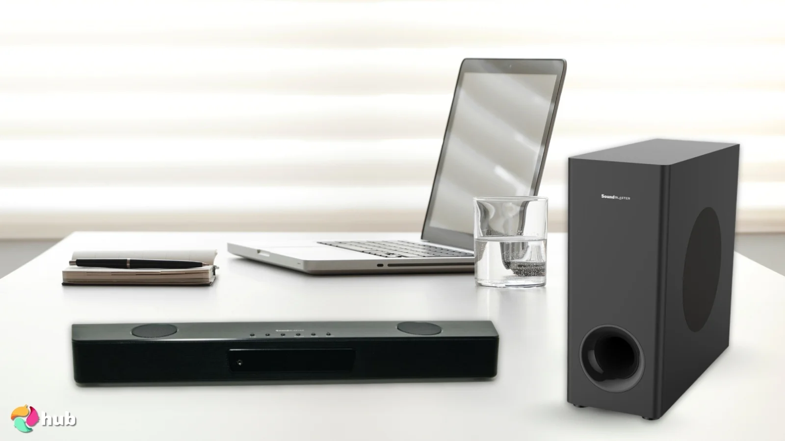 Creative Sound Blaster Katana V2 Soundbar with Subwoofer on a white office desk styled for a review