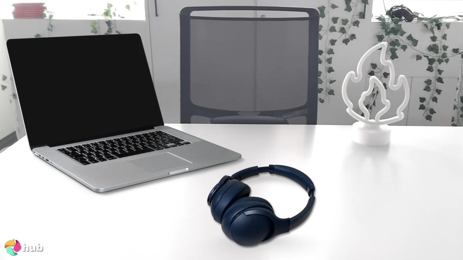 DOQAUS Life 4 Headphones on a white office desk in a clean setup for a review