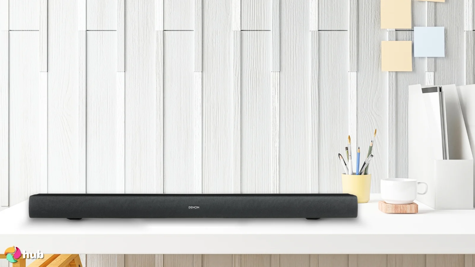 Denon DHT-C210 Soundbar on a white office desk styled neatly for a review