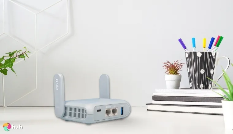 GL.iNet GL-MT3000 VPN Router on a white office desk in a top-down view for a review