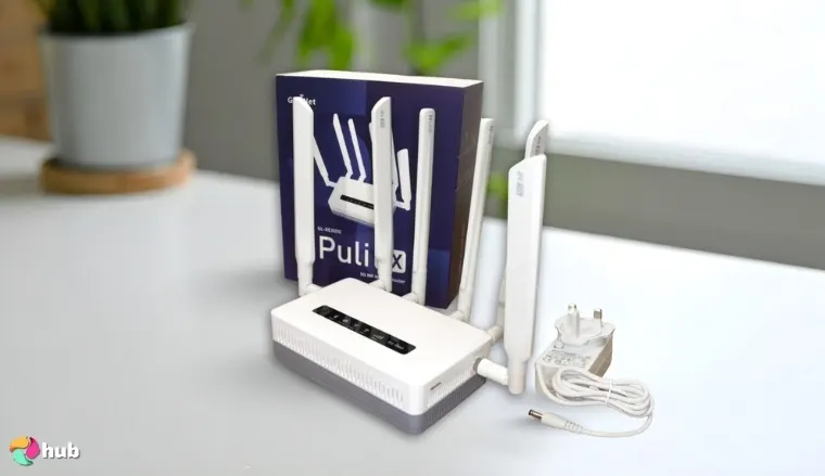 GL.iNet GL-XE3000 (Puli AX) Router on a white office desk styled neatly for a review