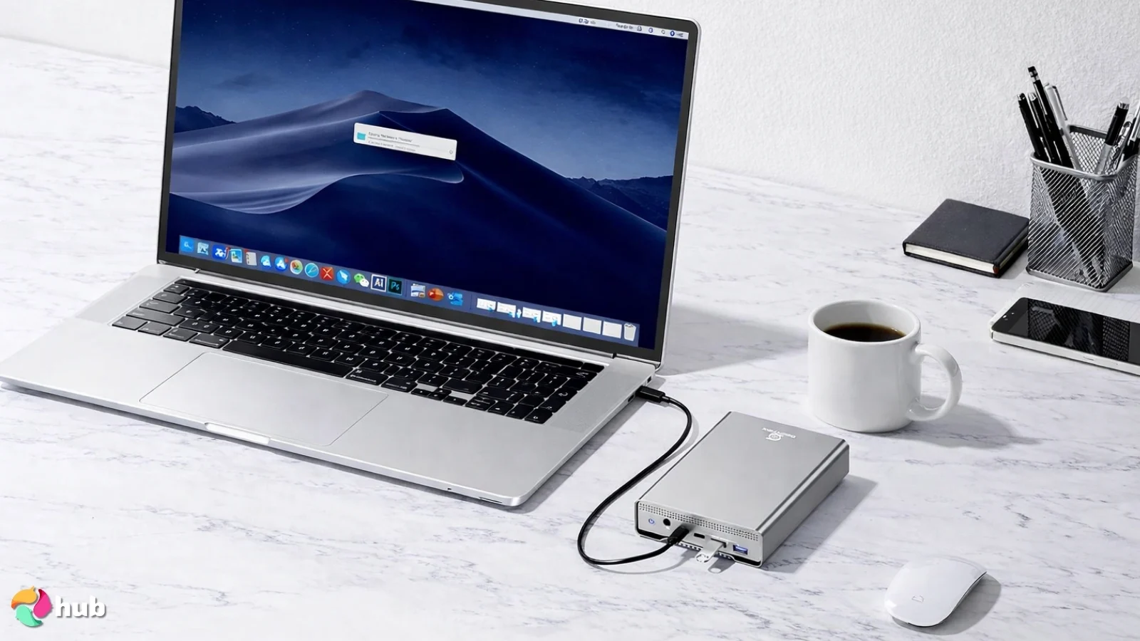 GX100 12TB External Hard Drive on a white office desk styled neatly for a review