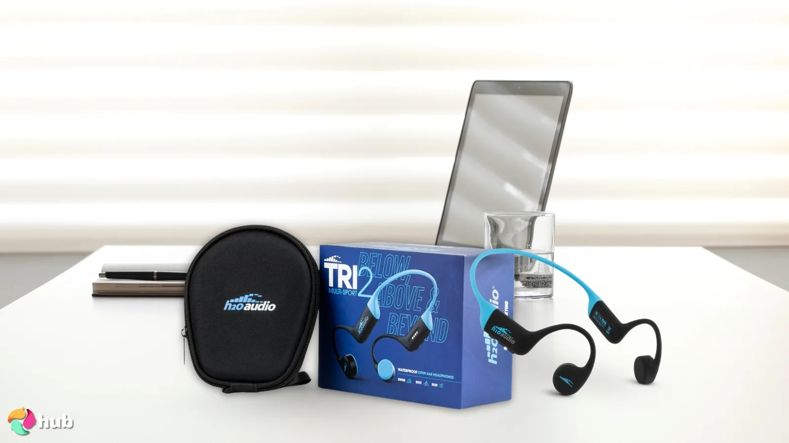 H2O Audio TRI 2 Headphones on a white office desk styled neatly for a review