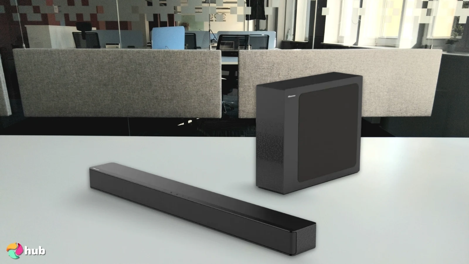 Hisense HS2100 2.1 Ch 240W Soundbar with Subwoofer on a white office desk with simple styling for a review