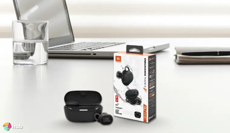 JBL Endurance Race 2 Earbuds on a white office desk in a bright workspace for a review