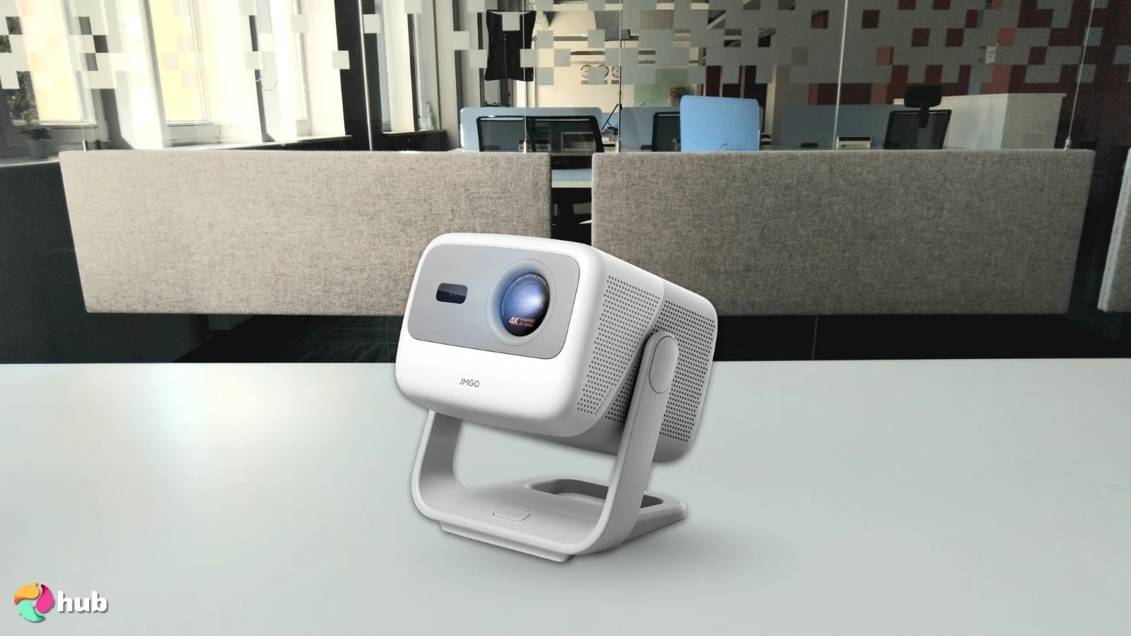 JMGO N1S 4K Portable Projector on a white office desk prepared for testing shots