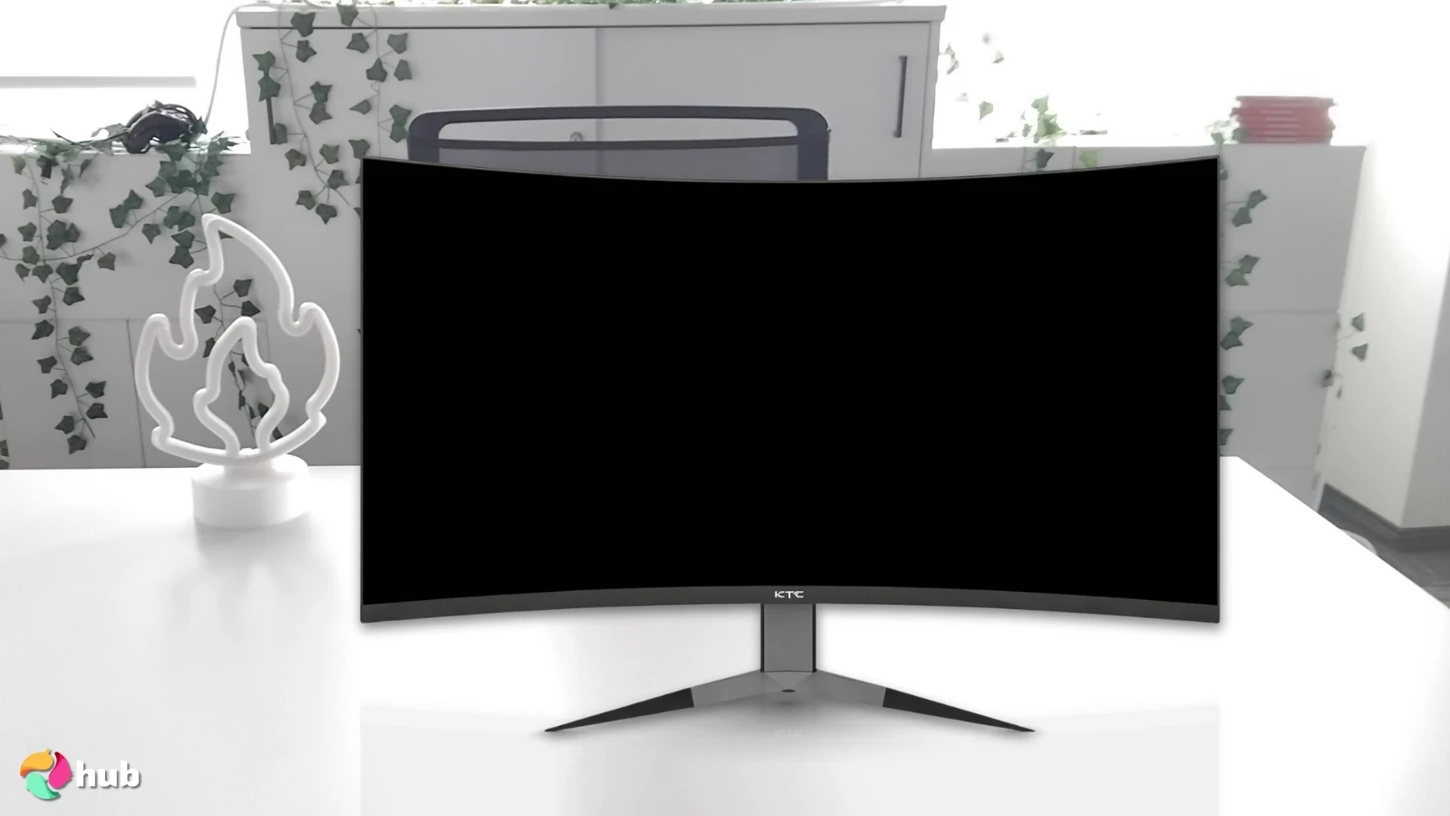 KTC 240Hz Curved Monitor on a white office desk in a minimalist setup for a review