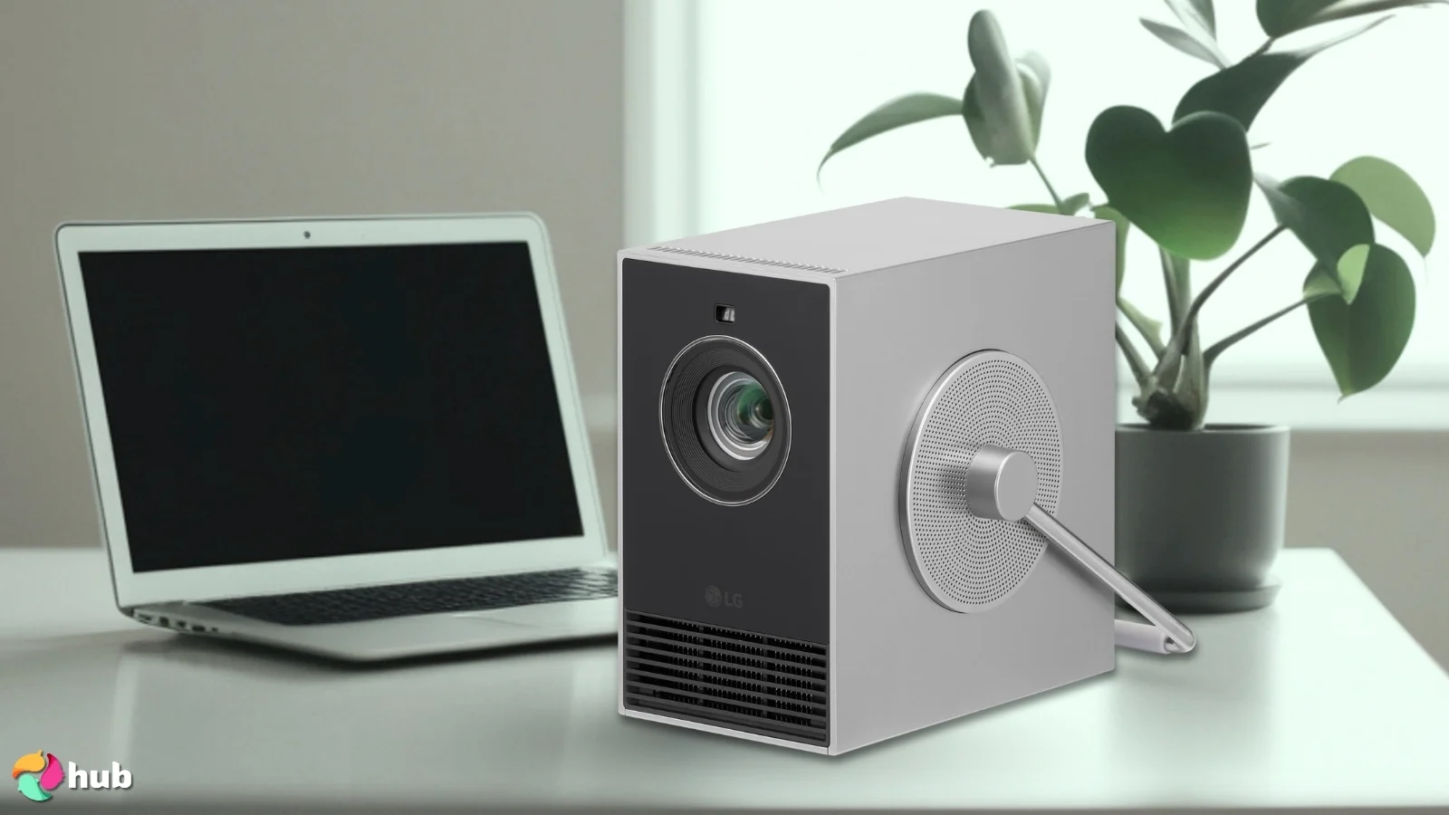 LG CineBeam Q HU710PB Projector on a white office desk positioned for photography