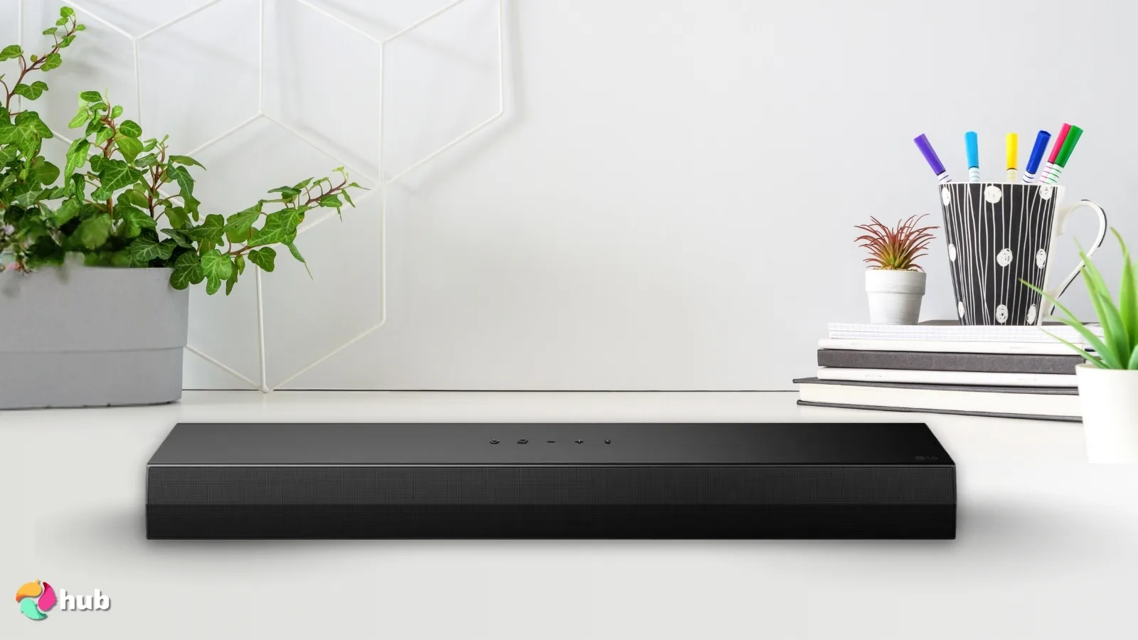 LG S20A Soundbar on a white office desk in a clean setup for a review