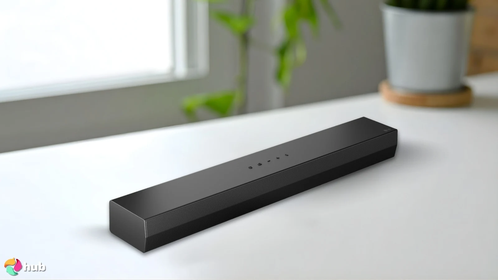 LG S20A Soundbar on a white office desk in a minimalist setup for a review