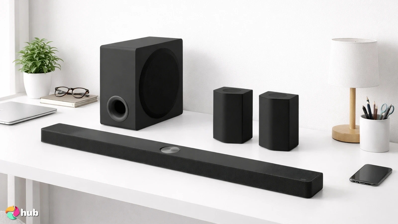 LG S95TR Soundbar on a white office desk with neat arrangement for a review