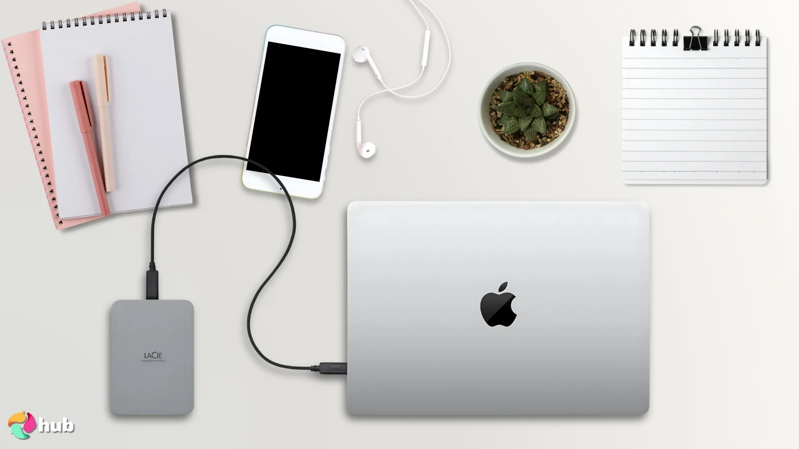 LaCie Mobile Drive External Hard Drive on a white office desk in a top-down view for a review