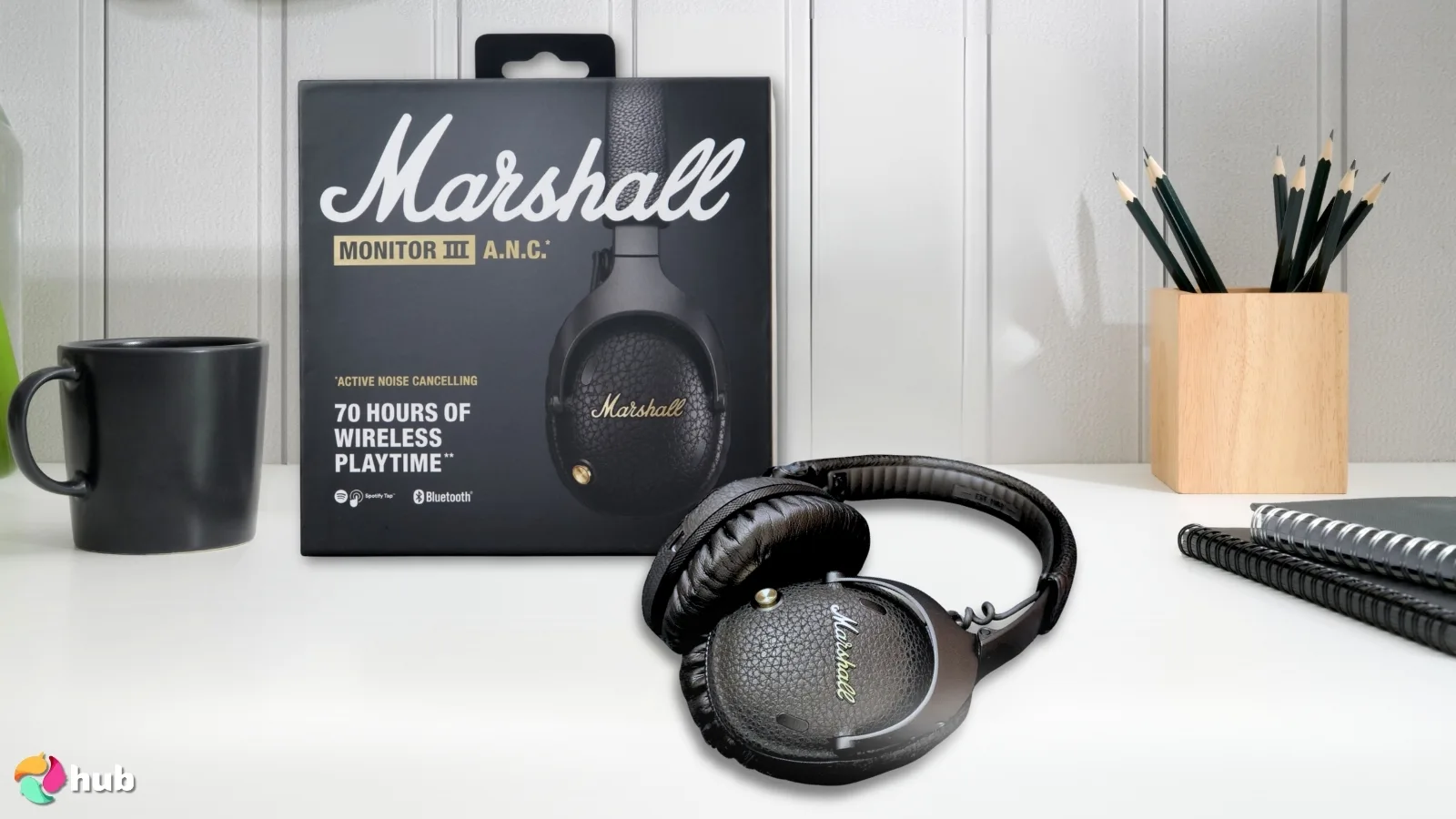 Marshall Monitor III A.N.C. Headphones on a white office desk with decorative items for a review