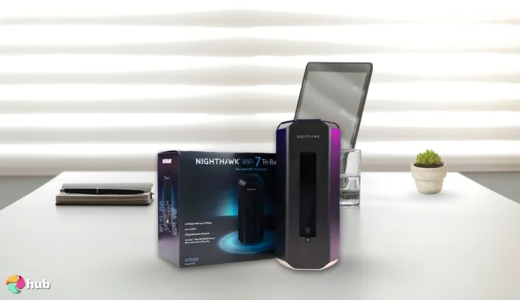 NETGEAR Nighthawk RS700S Wi-Fi Router on a white office desk with soft lighting for a review