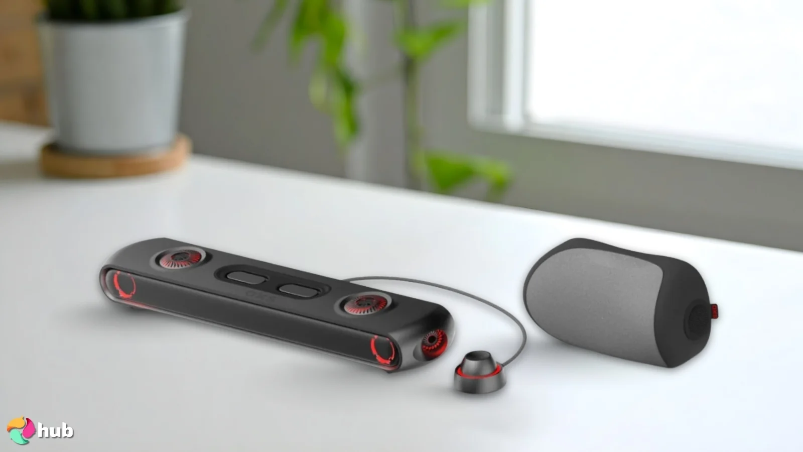 OXS Thunder Pro+ Dolby Atmos Soundbar on a white office desk set up for testing and review