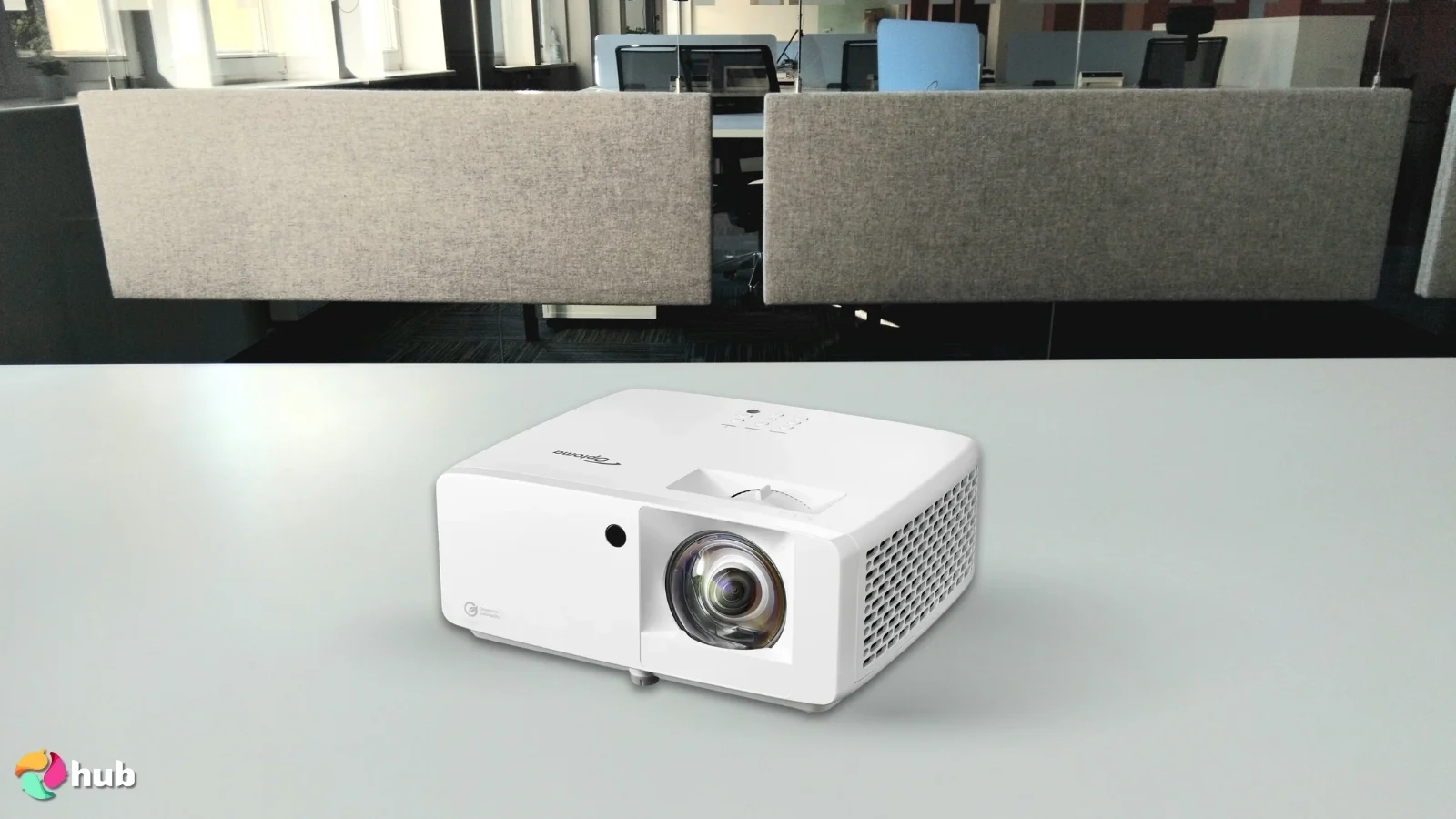Optoma GT2000HDR 4K Projector on a white office desk with simple styling for a review