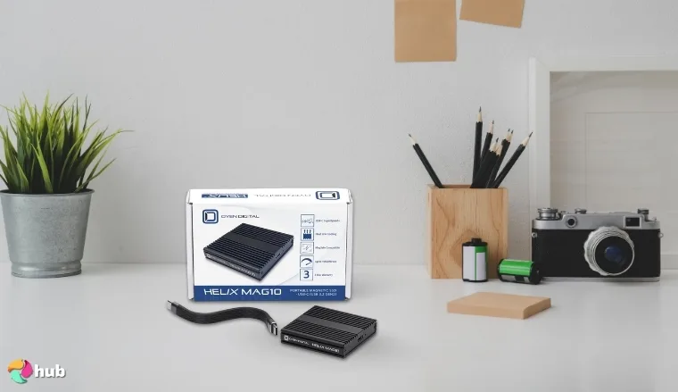 Oyen Digital Helix Mag10 Magnetic SSD for iPhone on a white office desk with balanced composition for a review