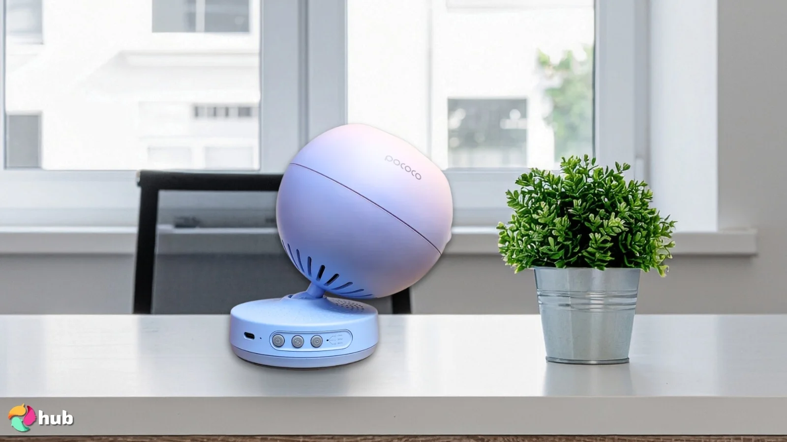 POCOCO Galaxy Star Portable Projector on a white office desk with neat arrangement for a review