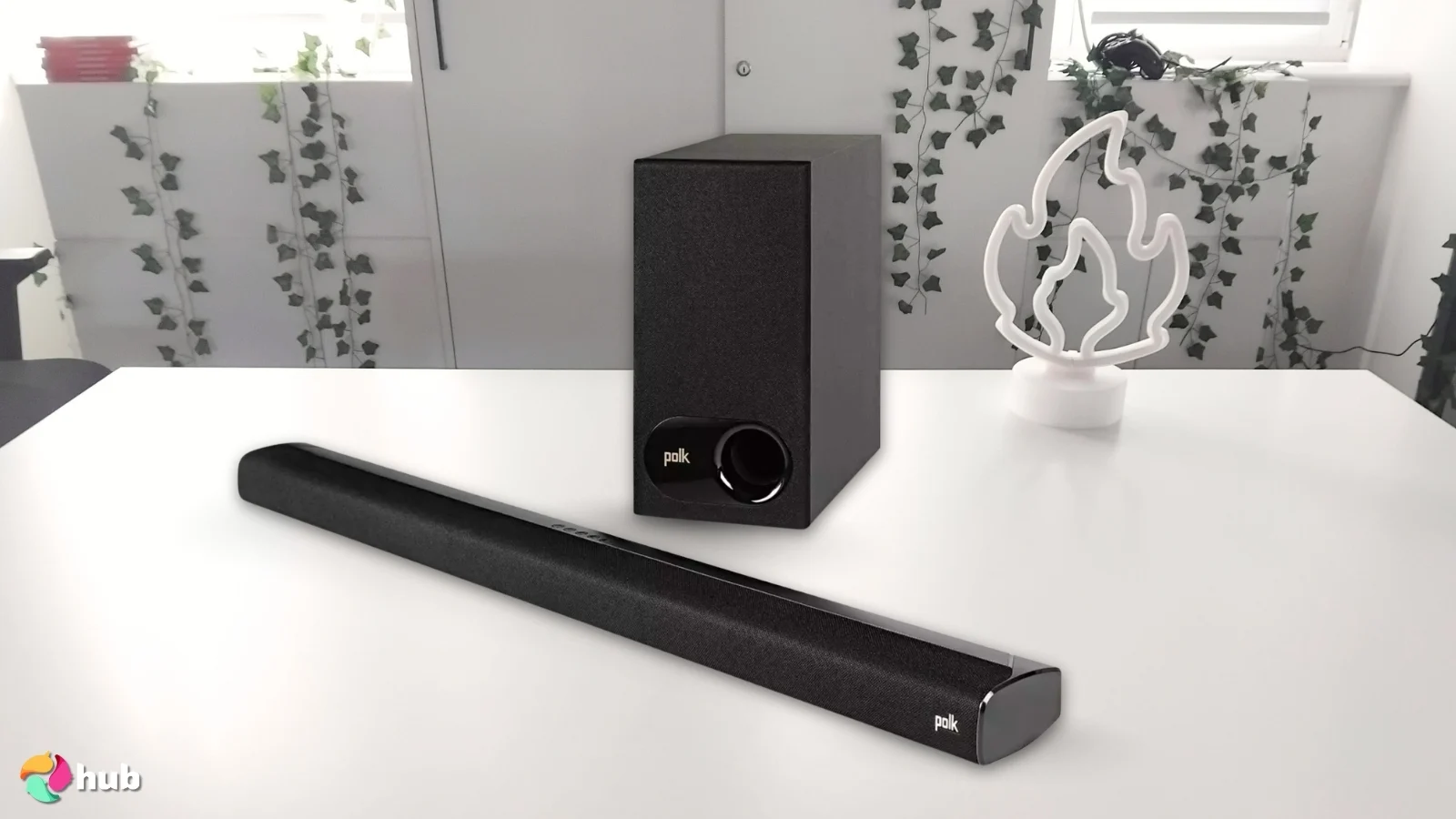 Polk Audio Signa S2 Soundbar with Subwoofer on a white office desk prepared for testing shots