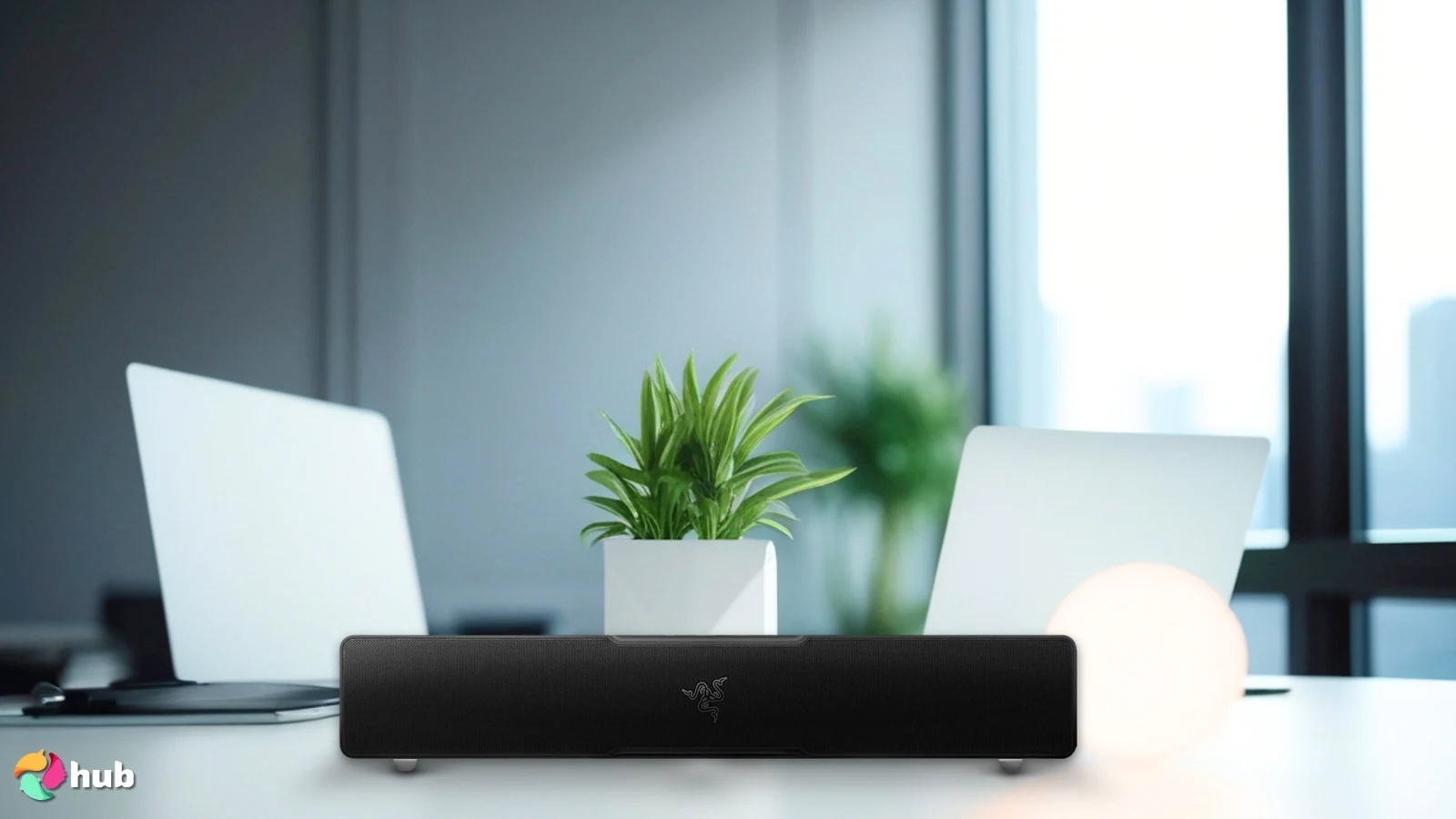 Razer Leviathan V2 X Soundbar on a white office desk with natural shadows for a review