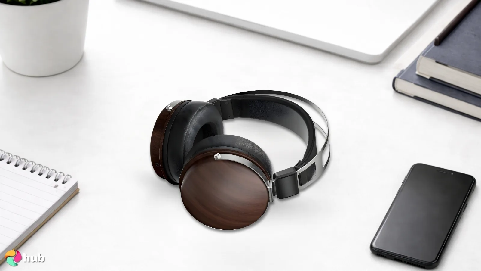 SEJJ Elmor 100 Headphones on a white office desk with soft lighting for a review