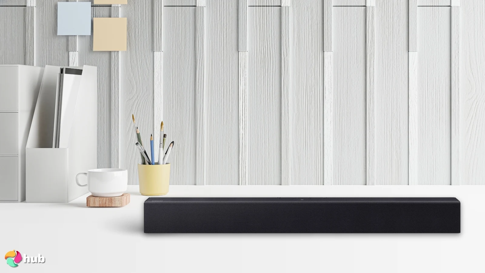 Samsung B-Series Soundbar HW B400F on a white office desk in a well-lit setting for a review