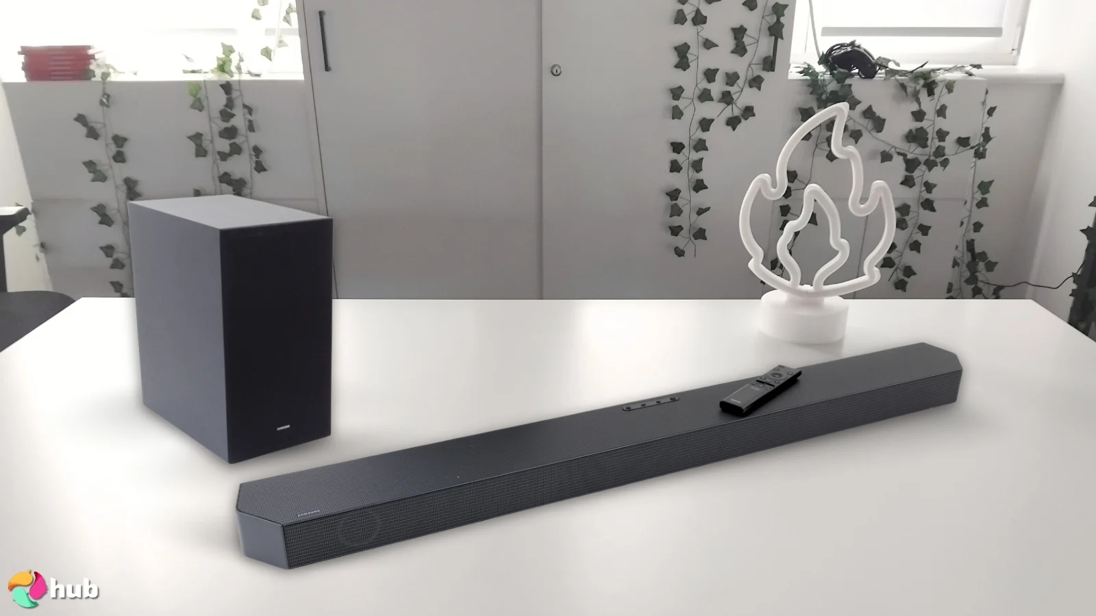 Samsung HW-Q600C Soundbar on a white office desk with minimal decor for a review