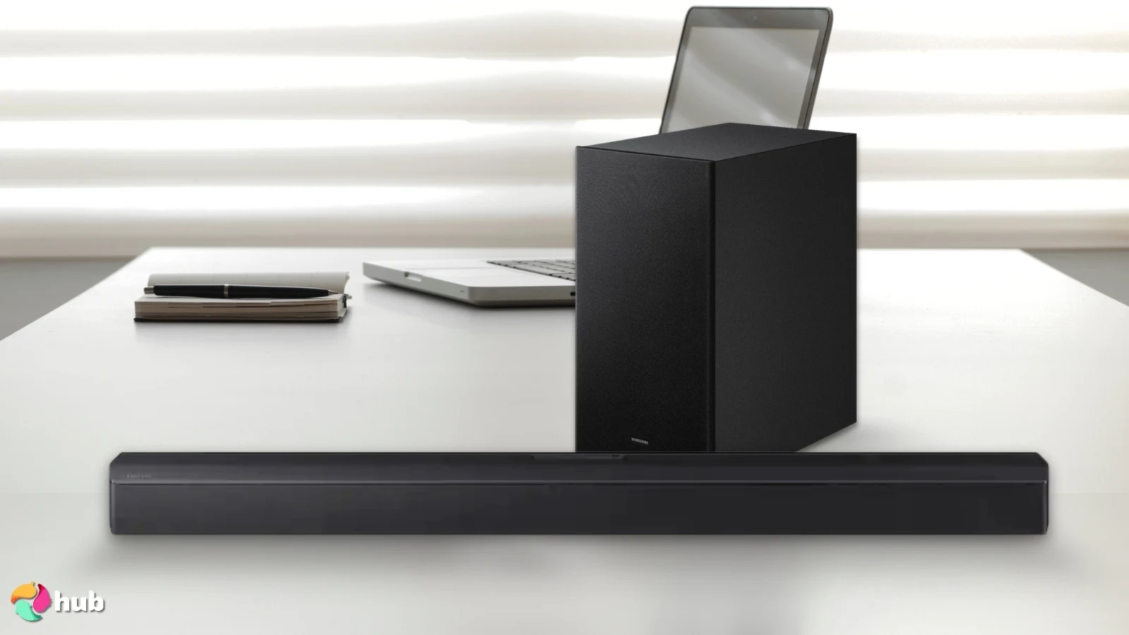 Samsung HW‑B550F Soundbar on a white office desk positioned for photography