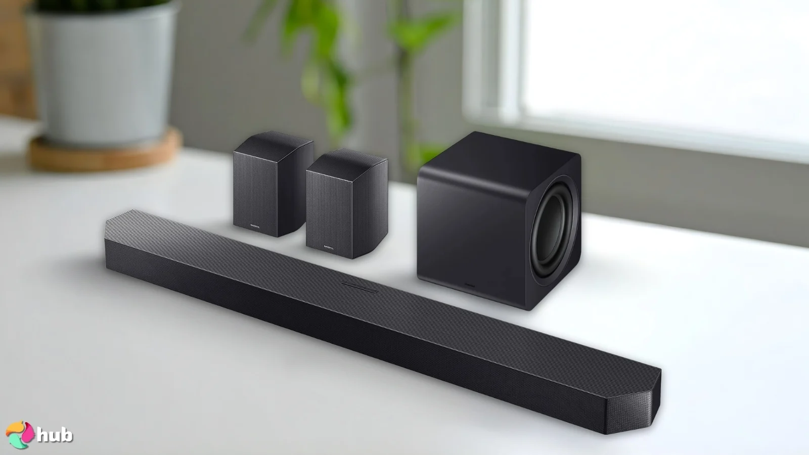 Samsung HW‑Q990F Soundbar on a white office desk with natural shadows for a review