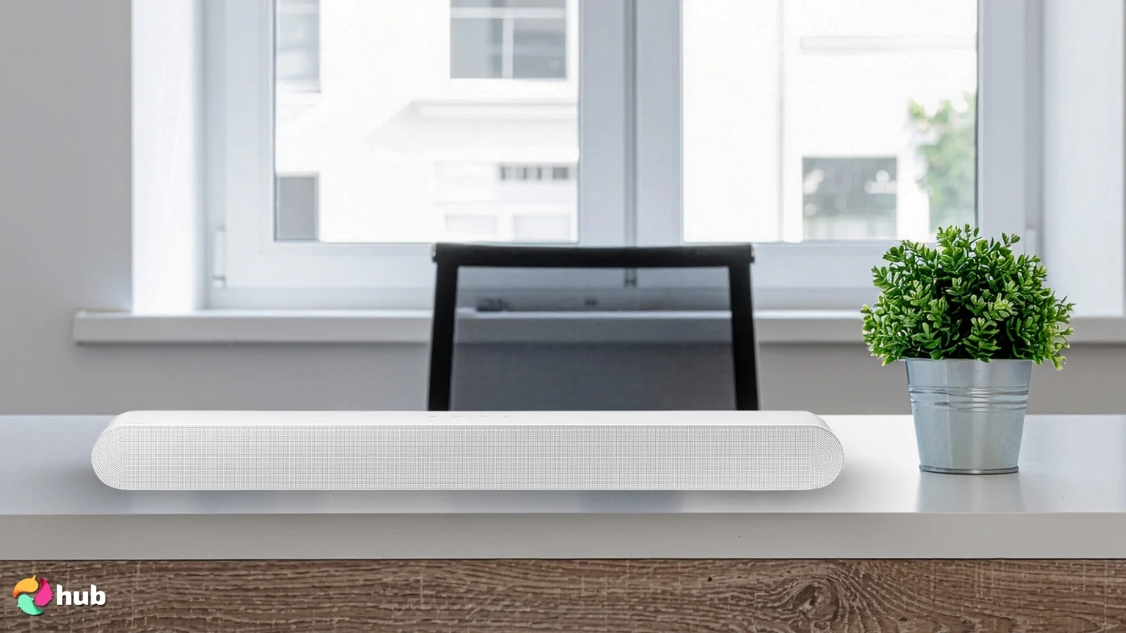 Samsung S61D Soundbar on a white office desk styled for promotional review