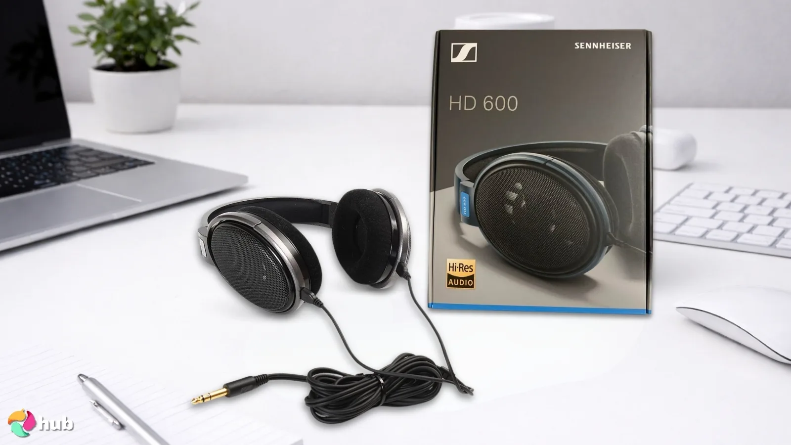 Sennheiser HD 600 Headphones on a white office desk styled for a review
