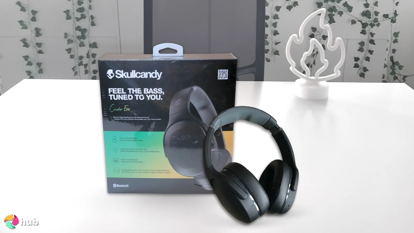 Skullcandy Crusher Evo Headphones on a white office desk ready for a product review