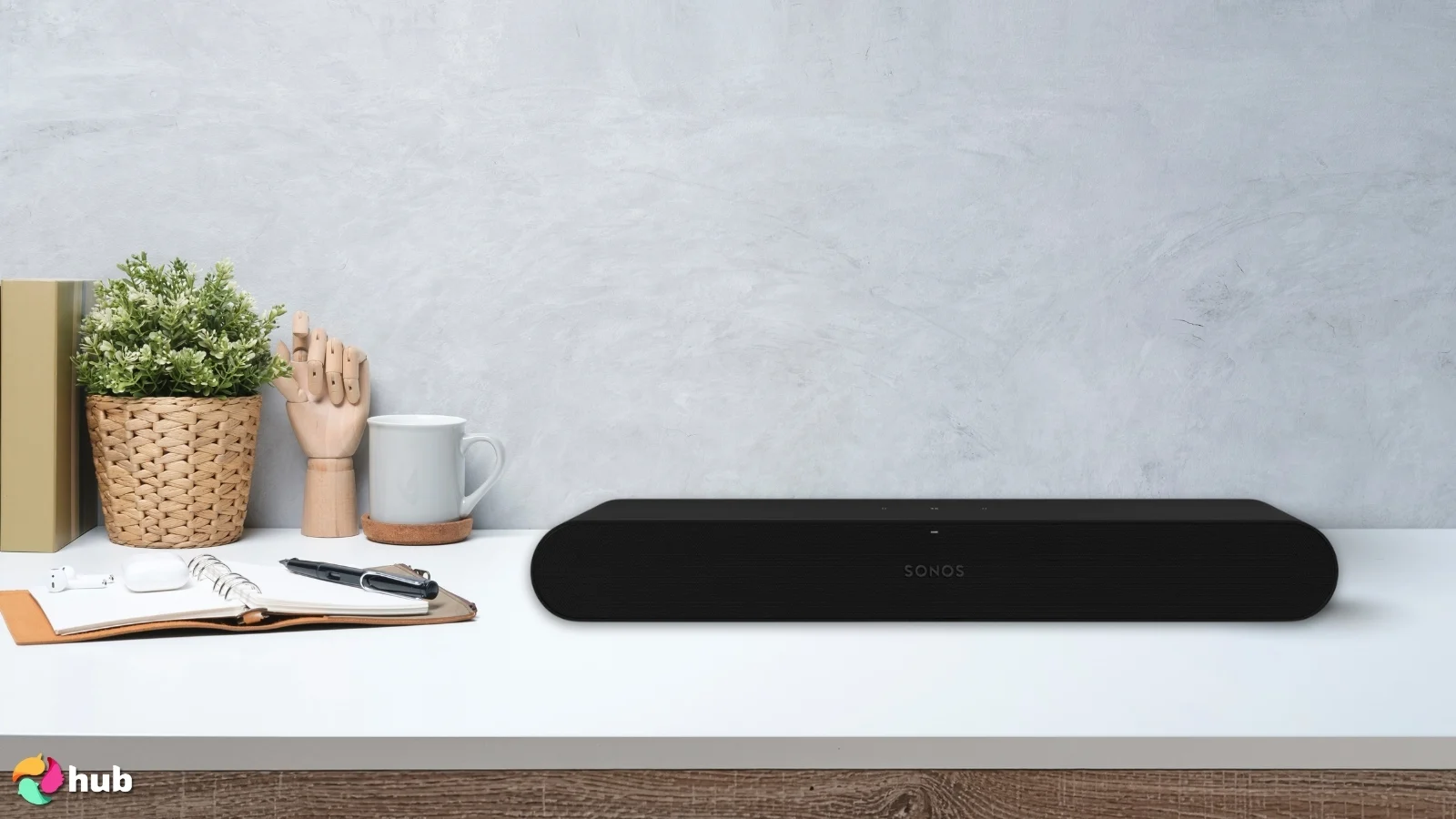 Sonos Ray Soundbar on a white office desk with neat arrangement for a review