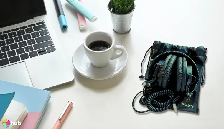 Sony MDR7506 Studio Headphones on a white office desk positioned for photography