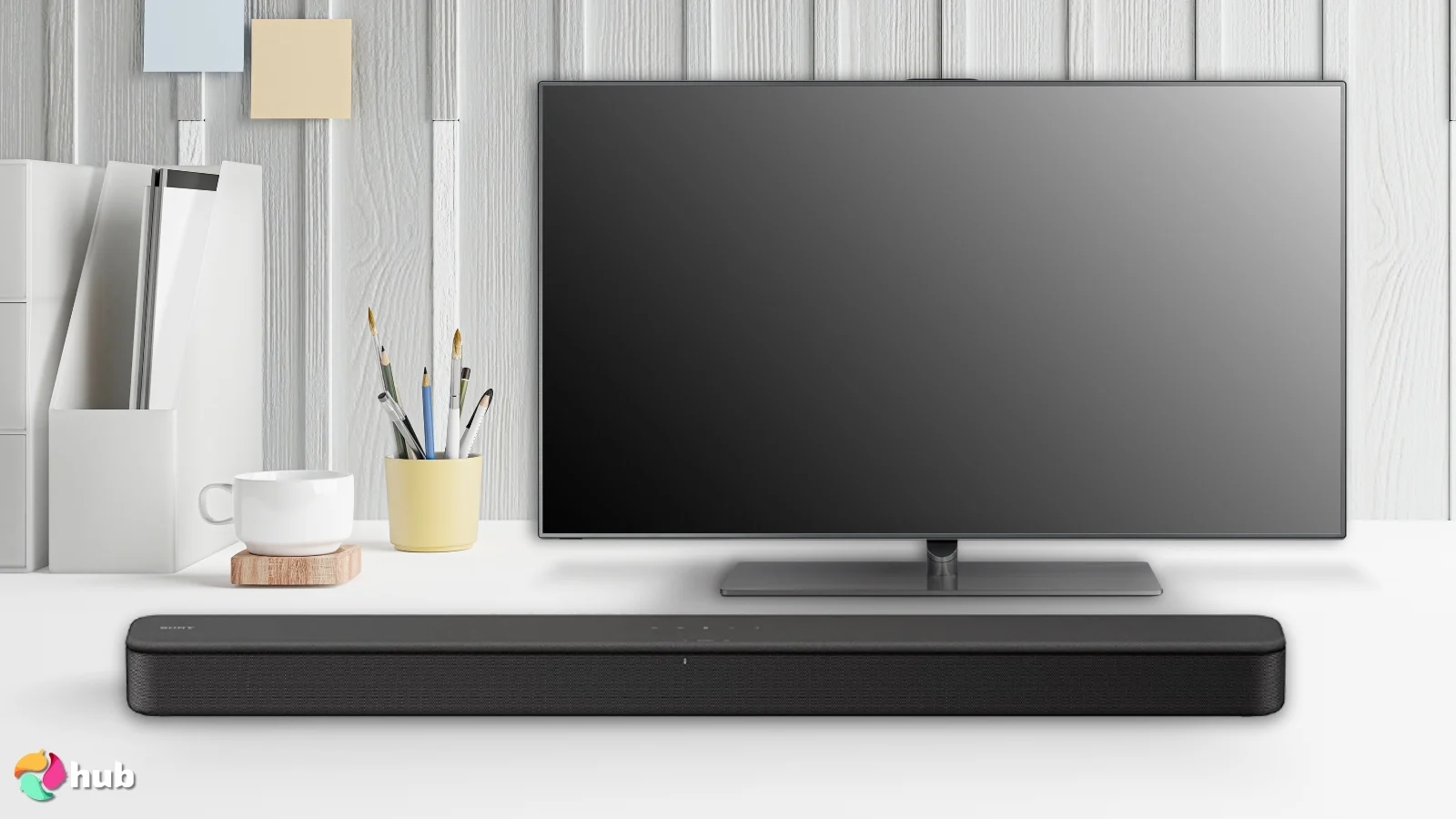 Sony S100F Soundbar on a white office desk with an editorial style for a review