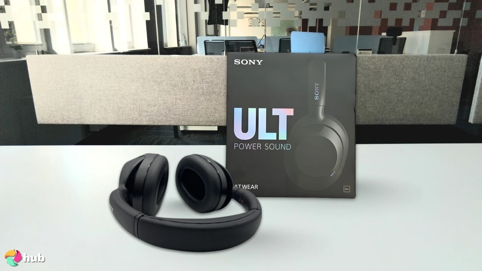 Sony ULT WEAR Headphones on a white office desk positioned for photography