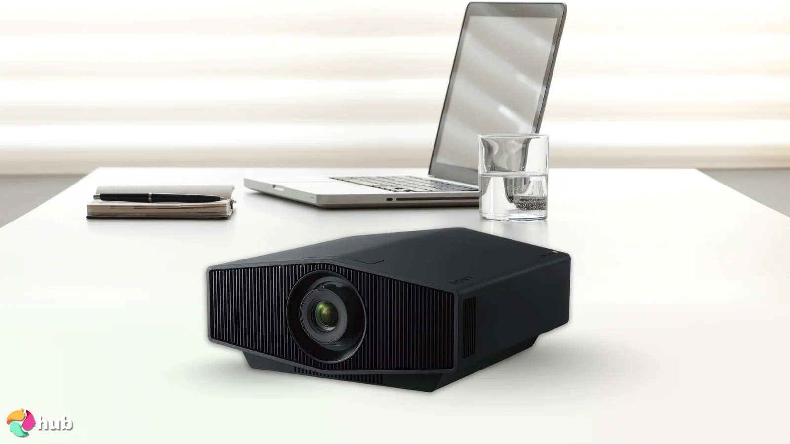 Sony VPL-XW5000ES Projector on a white office desk with simple styling for a review