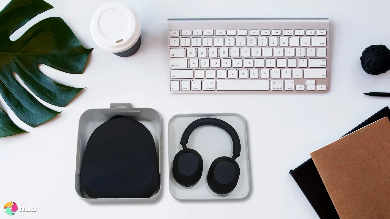 Sony WH-1000XM5 Premium Headphones on a white office desk styled neatly for a review