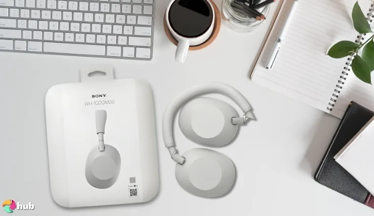 Sony WH-1000XM6 Studio Headphones on a white office desk with creative arrangement for a review