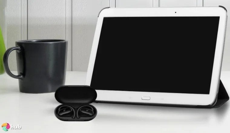 Soundcore V20i by Anker Open-Ear Headphones on a white office desk photographed for a review