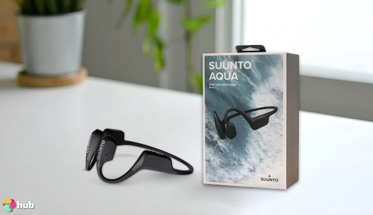 Suunto Aqua Running Headphones on a white office desk with an editorial style for a review