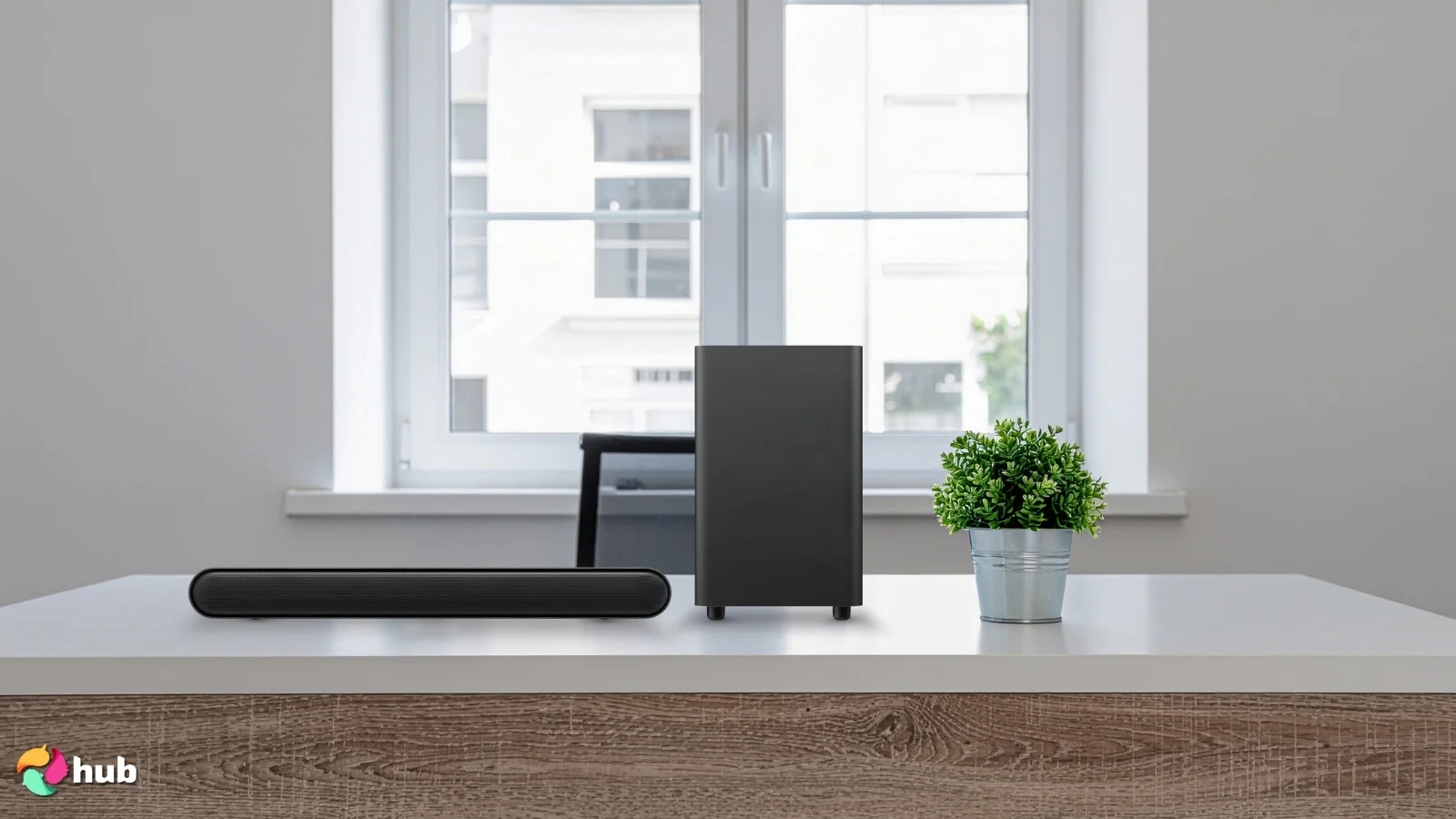 TCL S Class Soundbar on a white office desk with natural shadows for a review