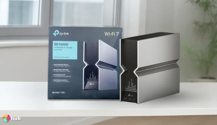 TP-Link Archer BE19000 Tri‑Band Wi‑Fi 7 Router Wi-Fi Router on a white office desk in a minimalist setup for a review