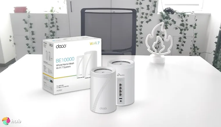 TP-Link Deco BE63 Wi-Fi 7 Router on a white office desk in a clean setup for a review