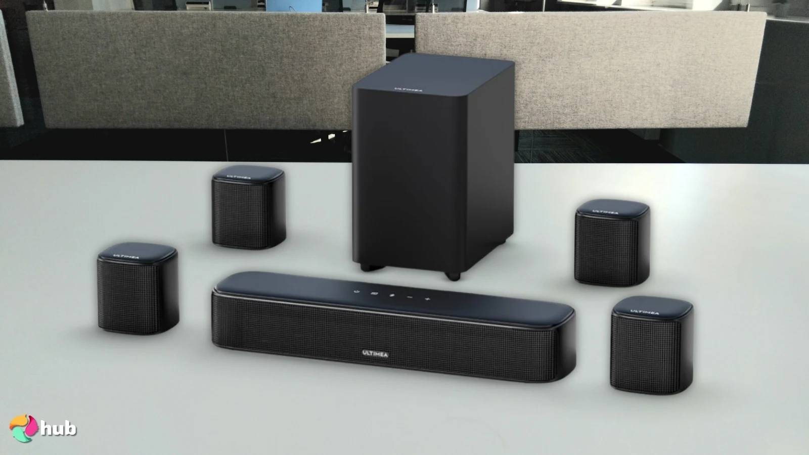 ULTIMEA 7.1ch Soundbar on a white office desk with soft lighting for a review