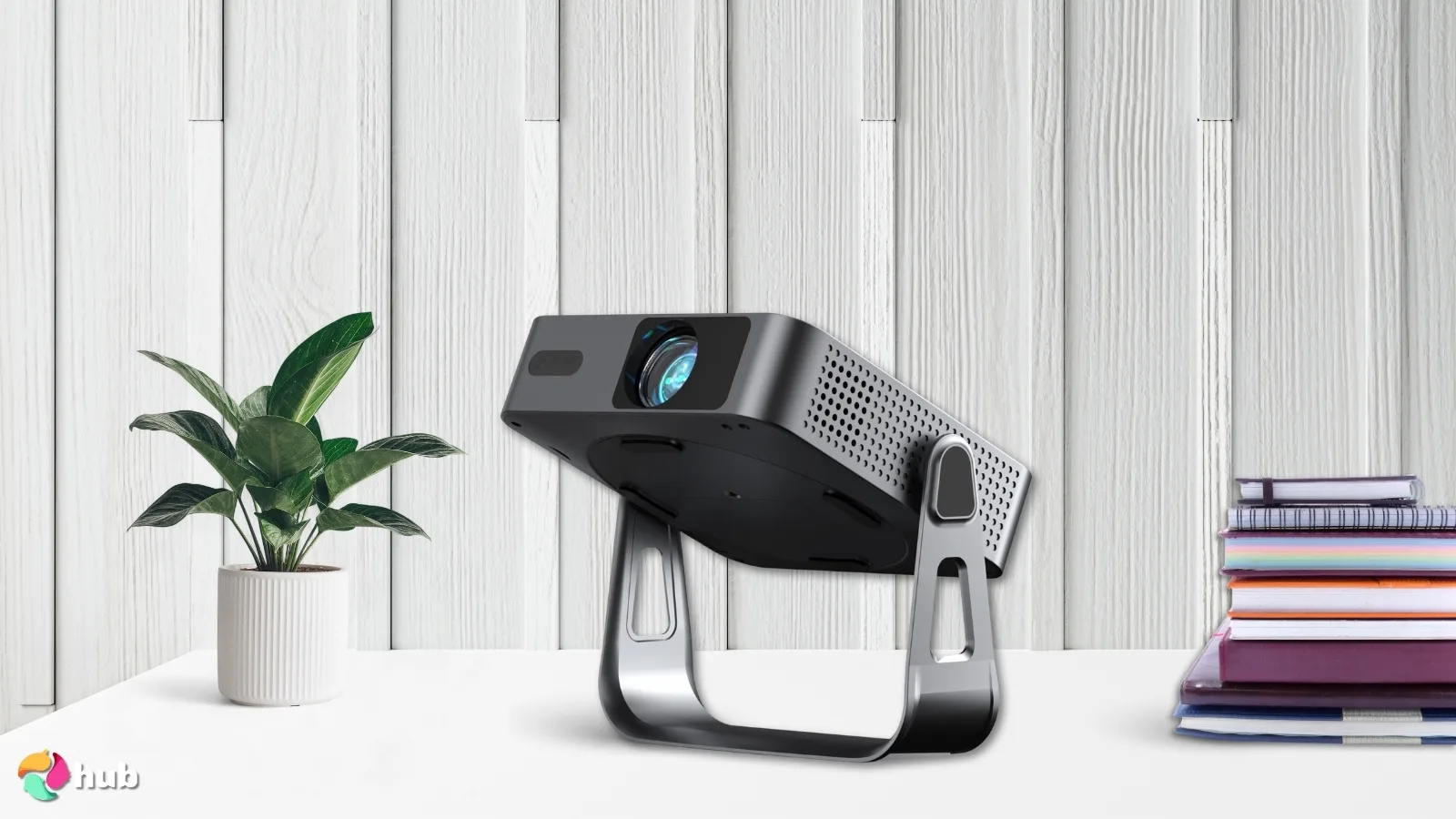 VOPLLS Q5 Projector on a white office desk styled for promotional review