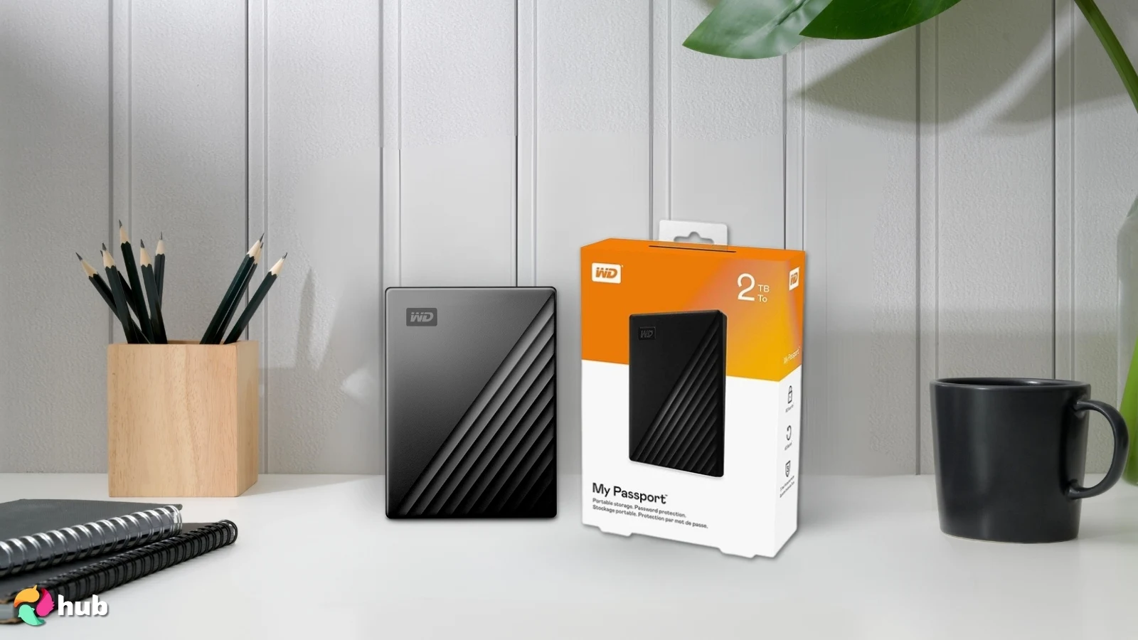 WD My Passport Hard Drive on a white office desk positioned for photography