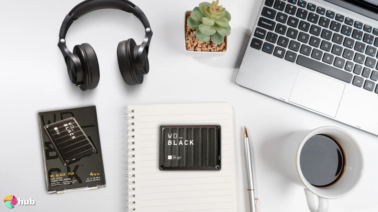 WD_Black P10 External Hard Drive on a white office desk with creative arrangement for a review